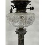 A Victorian plated corinthian oil lamp with Hink's duplex burner and cut clear glass fount. 25½"