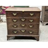A George III mahogany chest of two short over three long drawers on bracket feet. 37" wide. Break