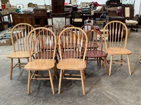 Two sets of stickback kitchen chairs.