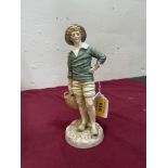 A Royal Worcester figure, French Fisherboy, modelled by James Hadley.