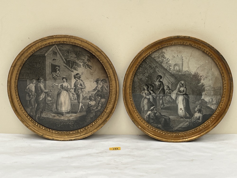 A pair of 18th Century engravings in gilt frames. 14½" diam.