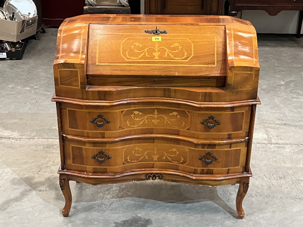A French style inlaid bureau with two drawers on cabriole legs. Of recent manufacture. 34" wide.