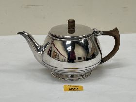 A George VI silver teapot. Sheffield 1937. 4½" high. 14ozs 9dwts gross.