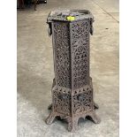 A late 19th Century French cast iron room heater. 27½" high.