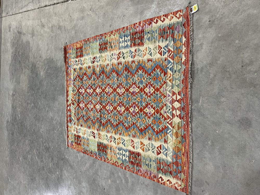 A Chobi Kilim rug 1.46m x 1.92m.