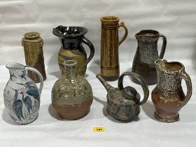 Eight items of studio pottery.