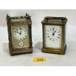 Two French brass carriage timepieces, one with alarm. 4½" and 4¼" high