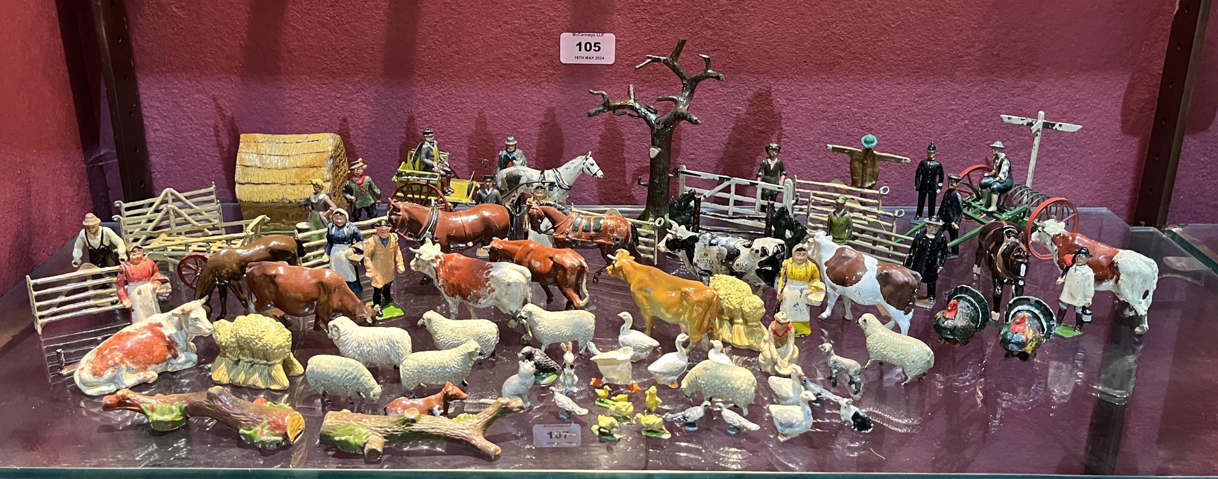 Britains Toys. A collection of farm animals, figures, carts, fencing etc.