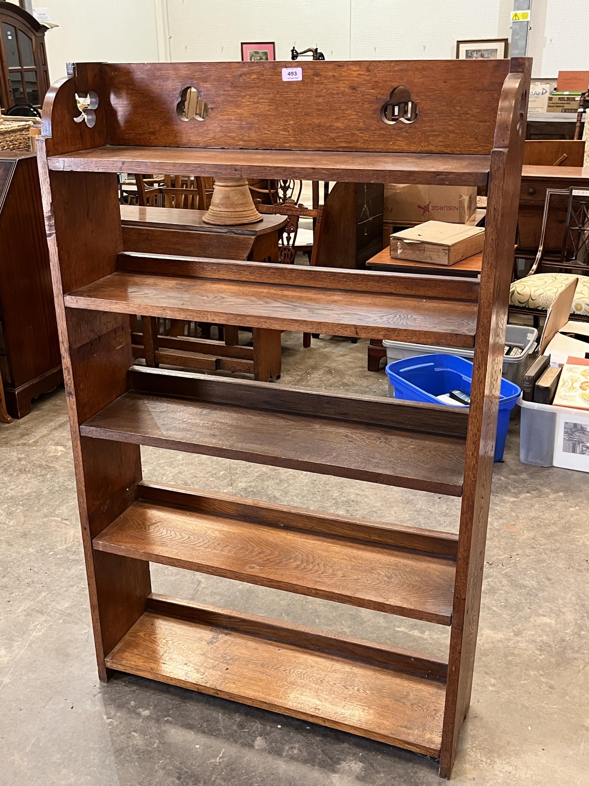 An oak Arts and Crafts open bookcase. 32"w x 54"h.