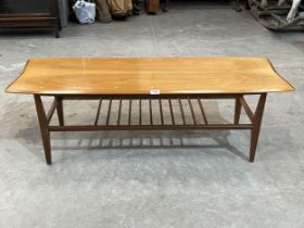 A 1970s low table with understage. 48" long.