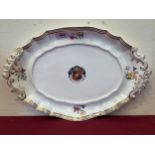 A 19th Century Davenport armorial oval dish. 18" wide.