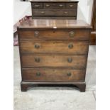 A George III mahogany chest of four long drawers, on bracket feet. 39" wide.