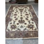 A cream ground Afghan carpet. 138" x 92"