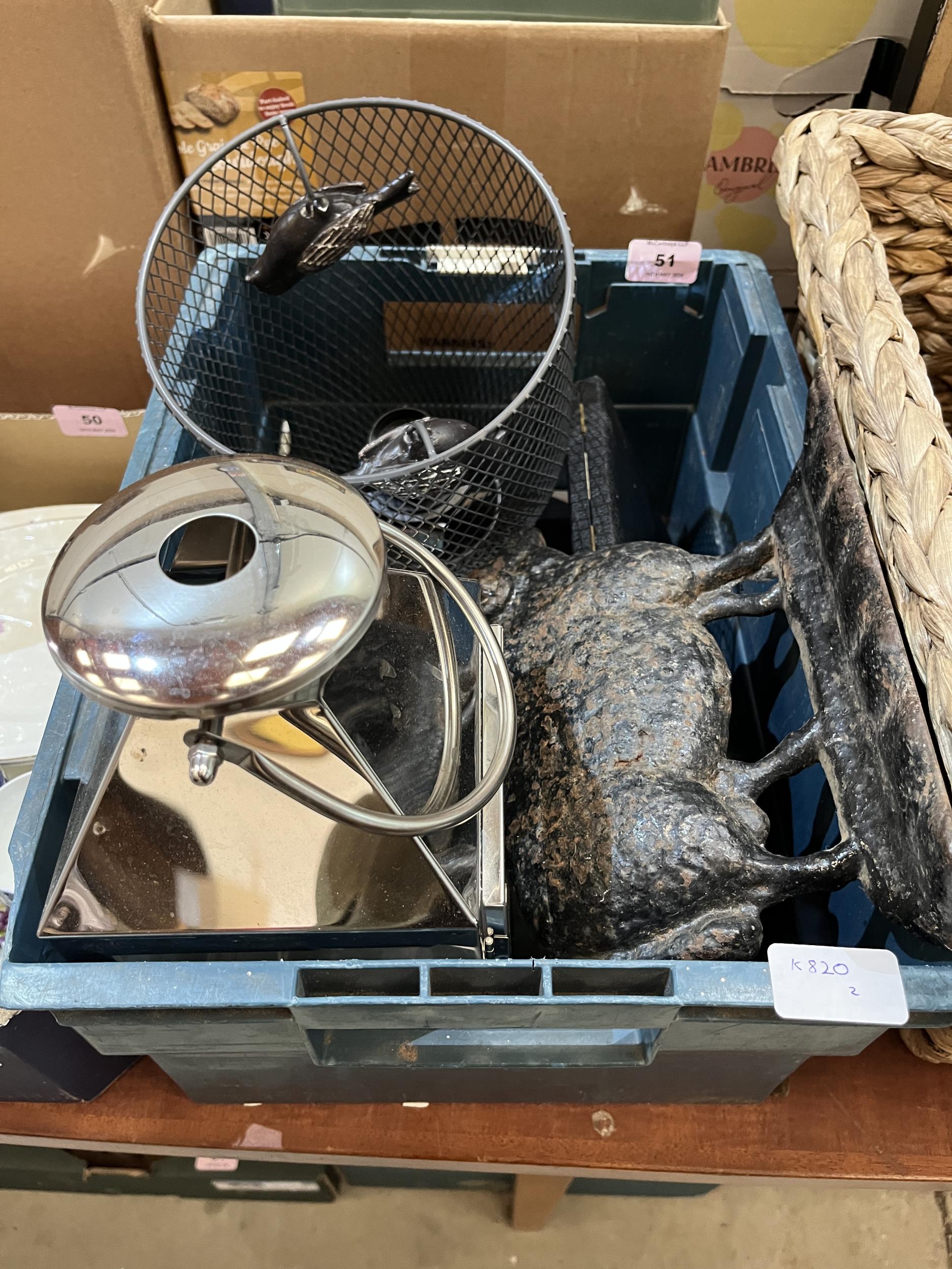 A wicker basket and two boxes of sundries.