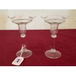 A pair of glass candlesticks, the rims applied with frosted glass birds. 5¼" high.