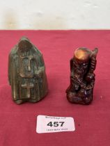 A bronze resinous chess piece and a netsuke.