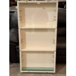 A display case with glass shelves. 48" x 24".