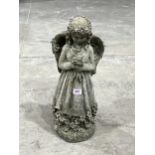 A garden statuary angel ornament. 18" high.