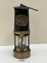 A Type 1 miner's lamp bearing brass plate for Thomas Williams, Aberdare. 9½" high.