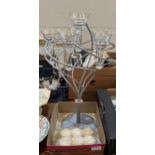 A floating candle stand with six candles.