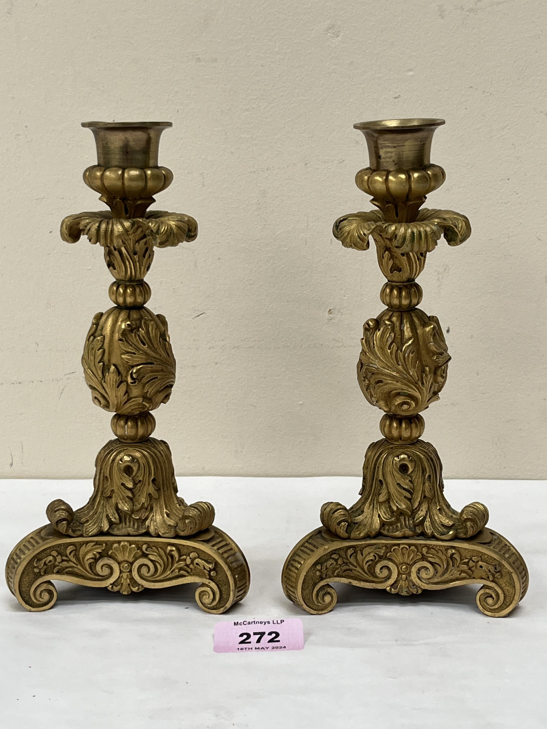 A pair of 19th Century French bronze ormolu candlesticks, 8½" high.
