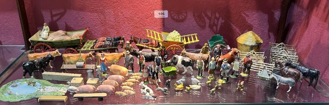 Britains Toys. Three wagons, farm animals, fencing, figures etc.