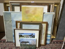 A quantity of oil paintings and prints.