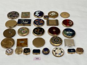 A collection of powder compacts and rouge pots.