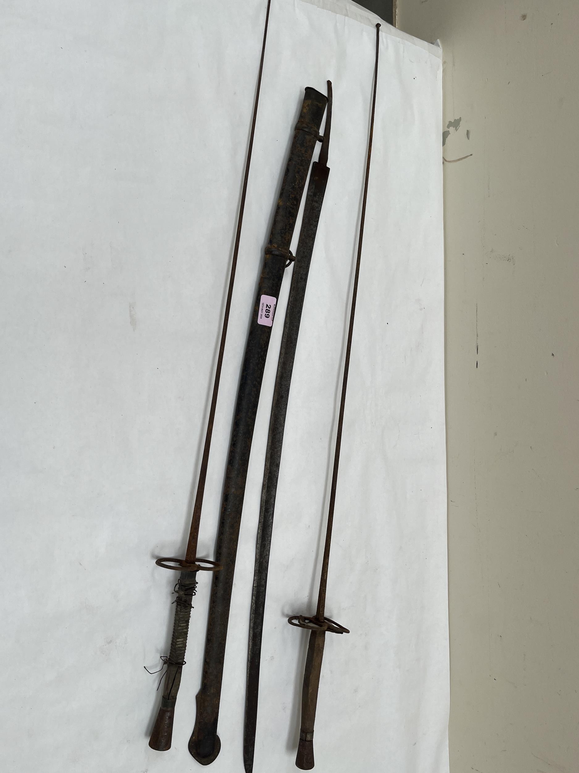 Two fencing foils and a 19th Century sabre with steel scabbard. (3)