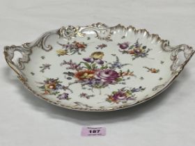 A Dresden tray, gilded and painted with sprays of summer flowers in coloured enmels. 13½" diam