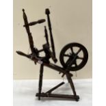 A Victorian flax spinning wheel, 30" high.