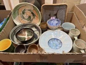 Two boxes of studio pottery.