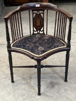 An Edward VII mahogany and inlaid corner chair.