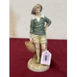 A Royal Worcester figure, French Fisherboy, modelled by James Hadley.