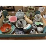 A box of studio pottery.