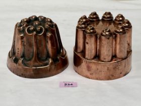 Two Victorian copper jelly moulds, one marked F.W. & Co 1200; the other 391. 4½" high and smaller.