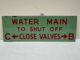 A double sided hanging enamel factory sign. 9½" x 26".
