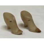 A pair of alabaster shoes, 3" long.