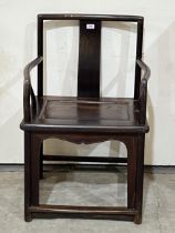 A 19th Century Chinese hardwood official's armchair.