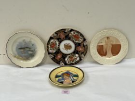 Four decorated plates by Quimper, Crown Ducal, Royal Doulton and Aynsley.