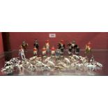 Britains Toys. A collection of hunting figures to comprise seven mounted huntsmen and ladies;