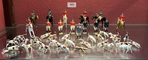 Britains Toys. A collection of hunting figures to comprise seven mounted huntsmen and ladies;