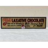 A glass advertising sign for Ucal laxative chocolate. 5½" x 21".