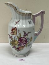 A Dresden chamber jug painted with summer flowers in coloured enamels. 14" high.