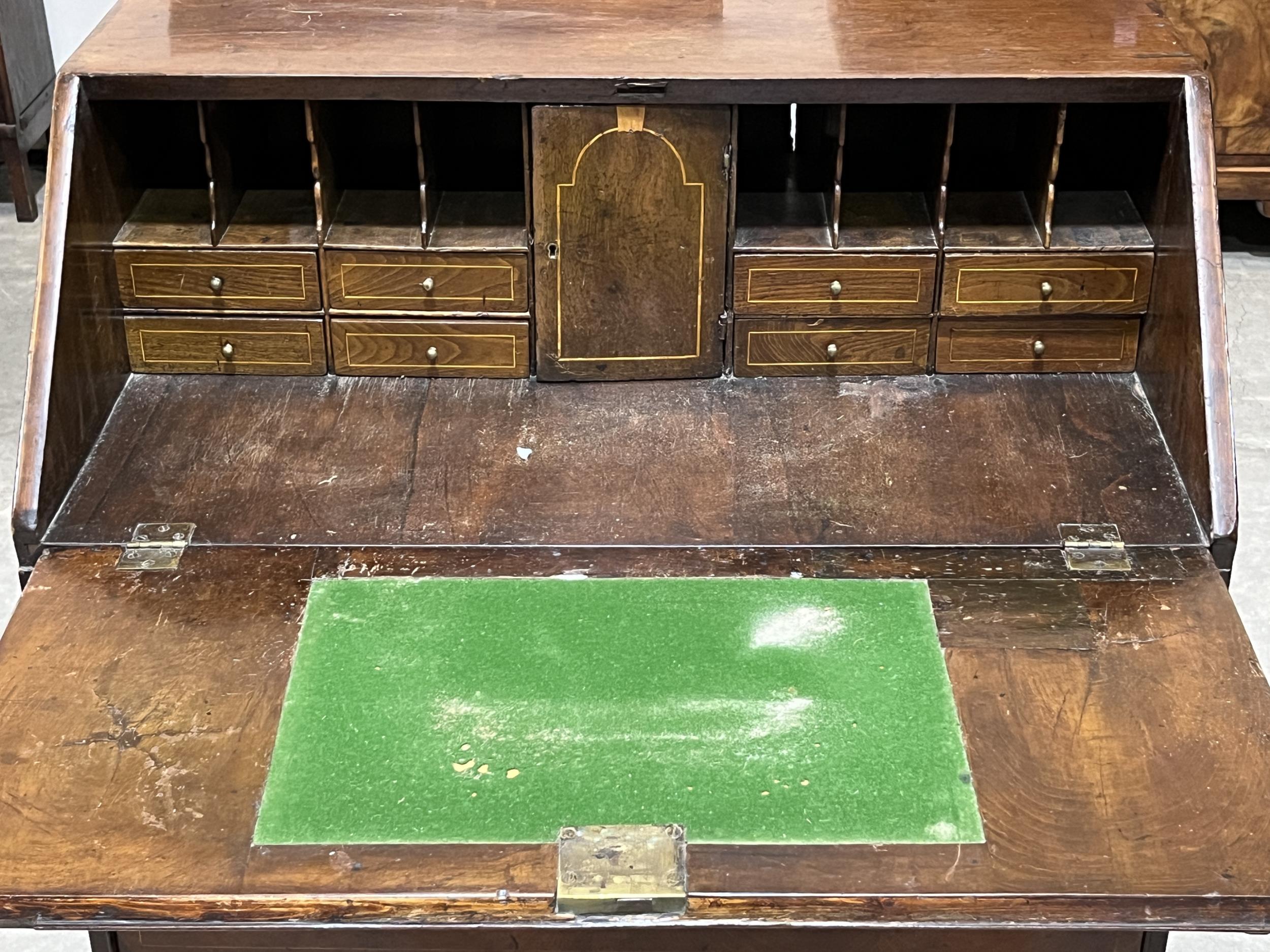 A George III yew wood bureau with fitted interior, raised on bracket feet. 33" wide. - Image 2 of 2