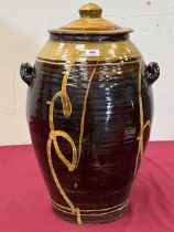 A slip glazed earthenware studio jar and cover. 26½" high.