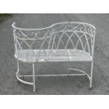 A wrought metal garden conversation seat. 41" wide.