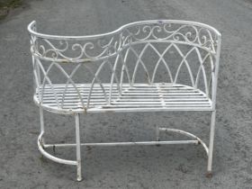 A wrought metal garden conversation seat. 41" wide.