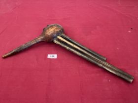 An African gourd woodwind instrument, 16" high.