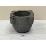 A marble mortar of lobed form. 5" high.